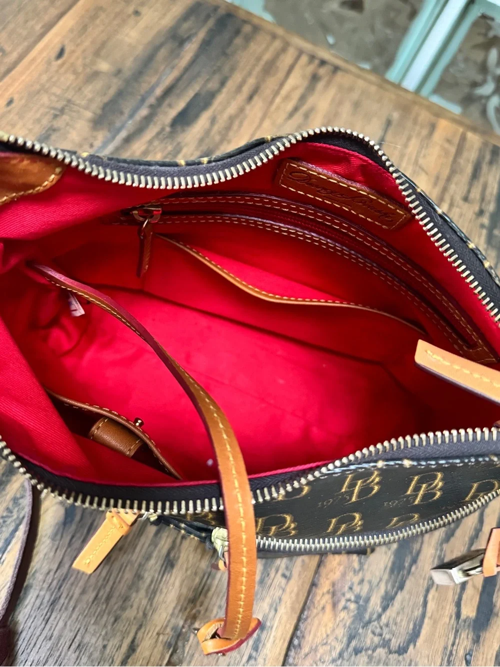 Dooney & Bourke retails $198